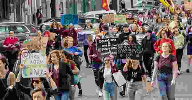 A Group Of People Marching With Signs The Embodied Brain And Sandtray Therapy: Stories Of Healing And Transformation