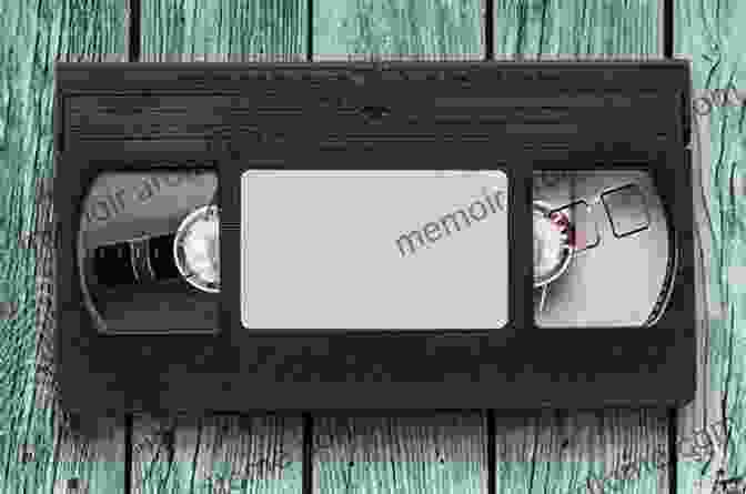 A Vintage VHS Player With A VHS Tape Inserted Killer Tapes And Shattered Screens: Video Spectatorship From VHS To File Sharing