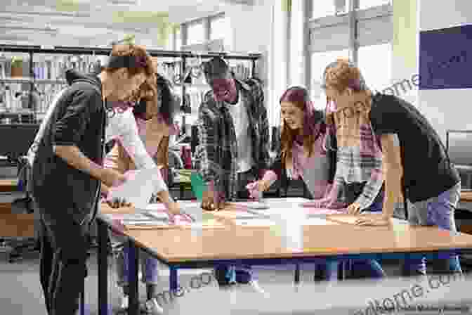 An Image Of A Group Of Students Collaborating Around A Table In A Learning Space Cognition And The Built Environment