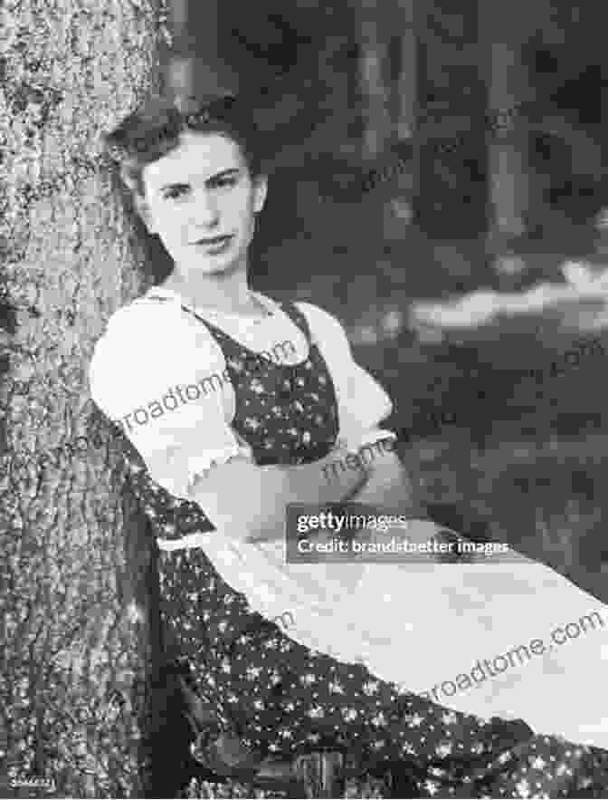 Anna Freud Stands With A Serious Expression, Wearing A Dark Dress And Pearls. The Interwoven Lives Of Sigmund Anna And W Ernest Freud: Three Generations Of Psychoanalysis