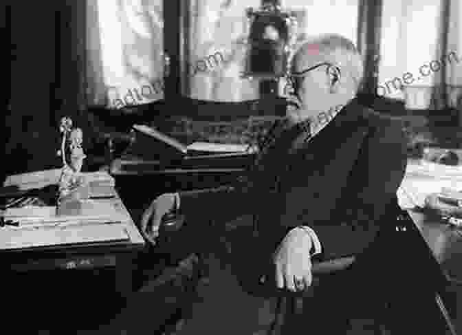 Ernest Freud, Seated With A Pen And Pad In Hand, Wearing A Suit And Tie. The Interwoven Lives Of Sigmund Anna And W Ernest Freud: Three Generations Of Psychoanalysis