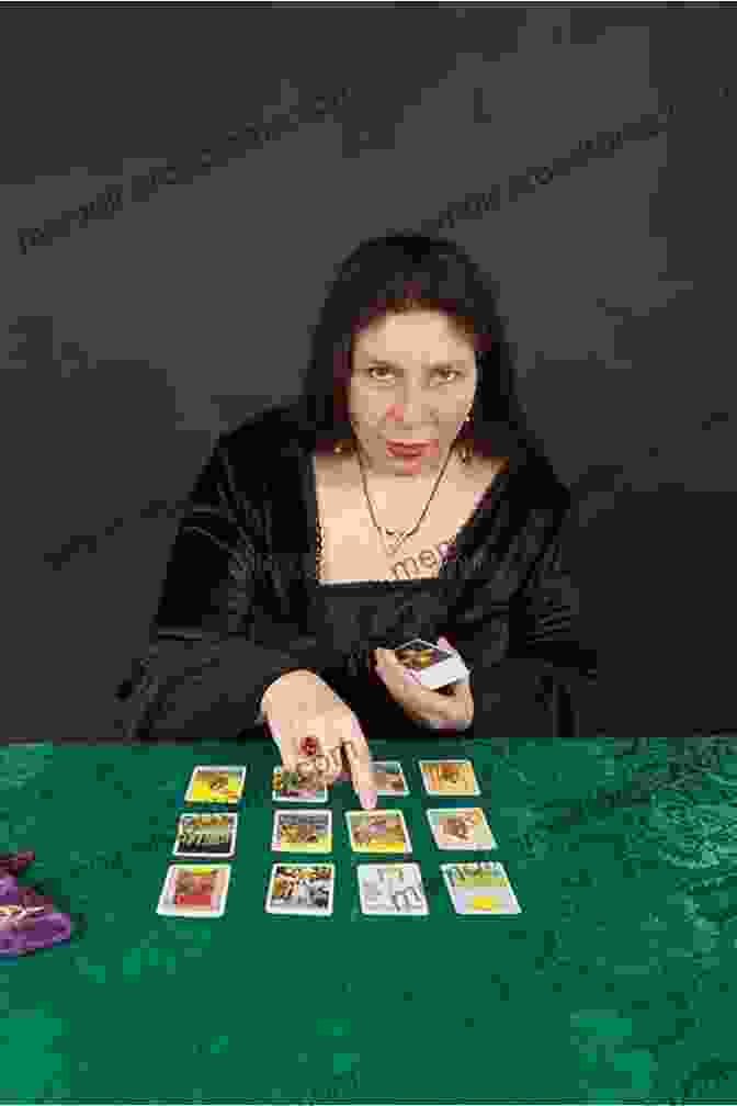 Woman Reading Tarot Cards Cartomancy: What You Need To Know